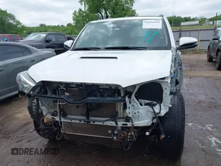 2021 Toyota 4Runner TRD Off Road Premium with VIN JTERU5JR3M5954879, listed as a IAAI auction lot 42291513 with 125,097 mi miles and . Bid and sale history available at DreamBid. Image 6.