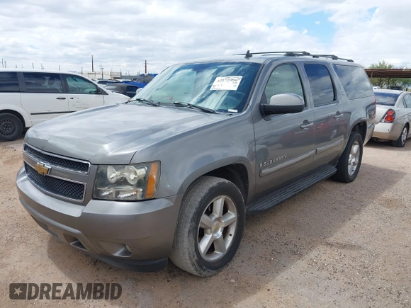 2007 Chevrolet Suburban LT with VIN 1GNFK16327J242103, listed as a IAAI auction lot 42172990 with 185,103 mi miles and . Bid and sale history available at DreamBid. Image 2.