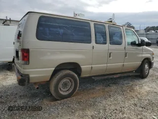 2010 Ford Econoline Passenger XL with VIN 1FMNE1BWXADA30935, listed as a Copart auction lot 77912734 with 153,775 mi miles and Salvage Title. Bid and sale history available at DreamBid. Image 3.