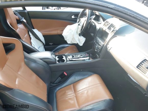 2014 Jaguar XK with VIN SAJWA4DC7EMB52199, listed as a IAAI auction lot 41191119 with 90,585 mi miles. Bid and sale history available at carsss.com. Image 5.