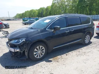2017 Chrysler Pacifica Touring L with VIN 2C4RC1BG7HR539716, listed as a IAAI auction lot 42037822 with 160,623 mi miles and . Bid and sale history available at DreamBid. Image 18.