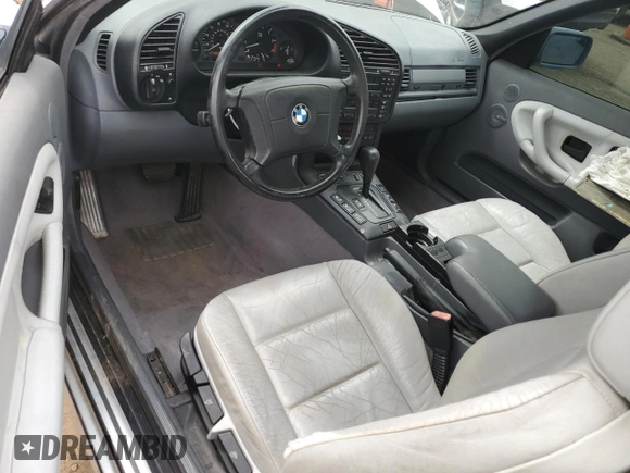 1998 BMW 3 Series 323i with VIN WBABJ8332WEM22760, listed as a Copart auction lot 59631805 with 77,300 mi miles and Salvage title. Bid and sale history available at DreamBid. Image 8.
