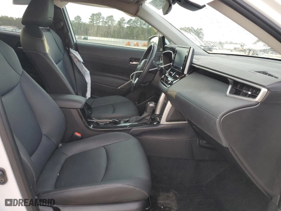 2022 Toyota Corolla Cross XLE with VIN 7MUEAAAG8NV029308, listed as a Copart auction lot 87407224 with 21,590 mi miles and Salvage Title. Bid and sale history available at carsss.com. Image 7.
