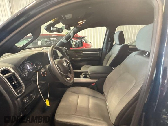2023 Ram 1500 Big Horn with VIN 1C6RRFFG7PN561014, listed as a IAAI auction lot 42836551 with 24,934 mi miles and . Bid and sale history available at DreamBid. Image 1.