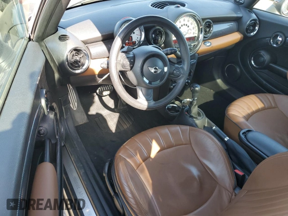 2013 MINI Hardtop S with VIN WMWSV3C5XDT396202, listed as a Copart auction lot 52175055 with 50,701 mi miles and Salvage Title. Bid and sale history available at DreamBid. Image 8.