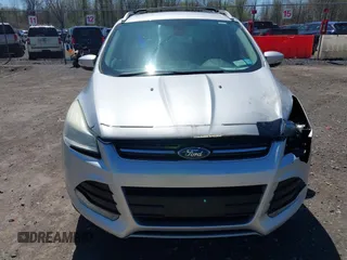 2016 Ford Escape Titanium with VIN 1FMCU9JX6GUB80715, listed as a IAAI auction lot 42060305 with 132,951 mi miles and . Bid and sale history available at DreamBid. Image 12.
