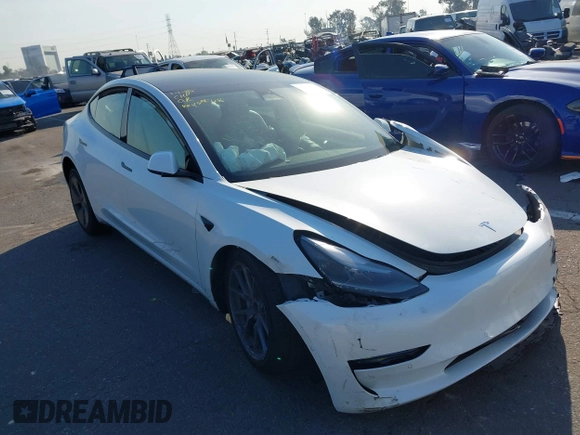 2022 Tesla Model 3 with VIN 5YJ3E1EA4NF319237, listed as a IAAI auction lot 41263761 with 44,384 mi miles and . Bid and sale history available at DreamBid. Image 1.