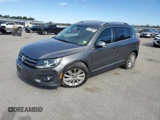 2012 Volkswagen Tiguan SE with VIN WVGBV7AX6CW003464, listed as a Copart auction lot 47248275 with 148,852 mi miles and Salvage title. Bid and sale history available at DreamBid. Image 1.