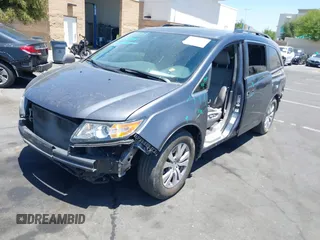 2014 Honda Odyssey EX-L z VIN 5FNRL5H61EB041962, wystawiony jako IAAI lot #42282873 z przebiegiem 134 884 mil mil oraz . Historia ofert i sprzedaży dostępna na DreamBid. Obrazek 2.