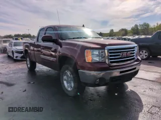 2013 GMC Sierra 1500 SLT z VIN 1GTR2WE70DZ280479, wystawiony jako Copart lot #58602555 z przebiegiem 140 849 mil mil oraz Szkoda całkowita • Salvage title. Historia ofert i sprzedaży dostępna na DreamBid. Obrazek 13.
