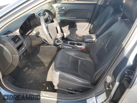 2012 Ford Fusion SEL z VIN 3FAHP0JA9CR333944, wystawiony jako Copart lot #56907605 z przebiegiem 180 386 mil mil oraz Szkoda całkowita • Salvage title. Historia ofert i sprzedaży dostępna na DreamBid. Obrazek 7.
