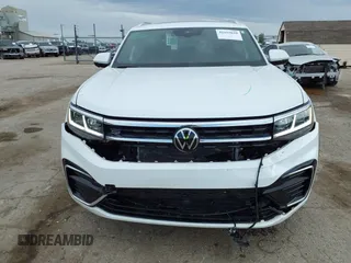 2023 Volkswagen Atlas SEL Premium R-Line z VIN 1V2FE2CA8PC221736, wystawiony jako IAAI lot #42155629 z przebiegiem 54 394 mil mil oraz . Historia ofert i sprzedaży dostępna na DreamBid. Obrazek 12.