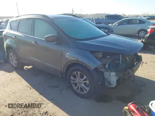 2017 Ford Escape SE z VIN 1FMCU0GD9HUB38906, wystawiony jako IAAI lot #41772488 z przebiegiem 108 259 mil mil oraz . Historia ofert i sprzedaży dostępna na DreamBid. Obrazek 1.