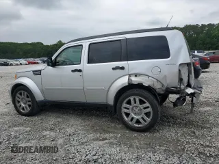 2011 Dodge Nitro Heat with VIN 1D4PU4GK4BW546420, listed as a Copart auction lot 54851415 with 165,789 mi miles and Salvage title. Bid and sale history available at DreamBid. Image 2.