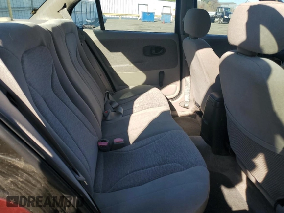 2001 Saturn SL z VIN 1G8ZK54731Z305098, wystawiony jako Copart lot #83875424 z przebiegiem 82 879 mil mil oraz Tytuł czysty. Historia ofert i sprzedaży dostępna na DreamBid. Obrazek 10.