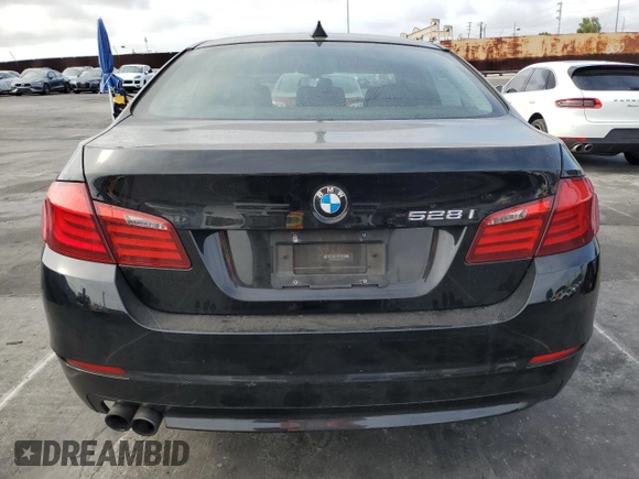 2012 BMW 5 Series 528i with VIN WBAXG5C52CDX04757, listed as a Copart auction lot 55451685 with 118,337 mi miles and Clean Title. Bid and sale history available at carsss.com. Image 6.