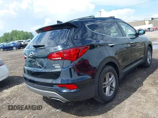 2017 Hyundai Santa Fe 2.4L with VIN 5XYZUDLB6HG444974, listed as a IAAI auction lot 42624735 with 59,075 mi miles and . Bid and sale history available at DreamBid. Image 4.