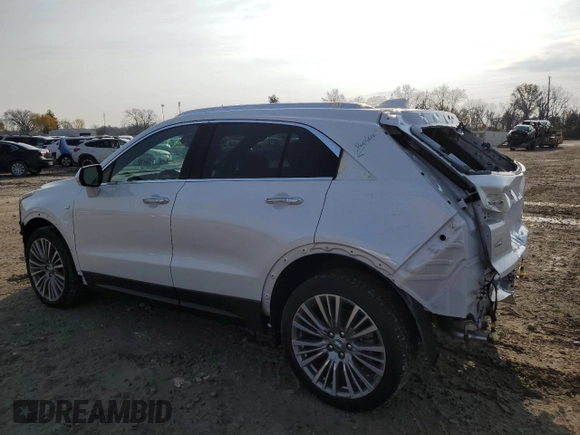 2024 Cadillac XT4 AWD Premium Luxury with VIN 1GYFZDR40RF225603, listed as a Copart auction lot 87899975 with 1,659 mi miles and Salvage title. Bid and sale history available at DreamBid. Image 2.
