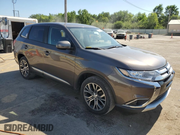 2018 Mitsubishi Outlander ES with VIN JA4AZ3A38JZ013798, listed as a Copart auction lot 62753915 with 111,069 mi miles and Salvage title. Bid and sale history available at DreamBid. Image 4.