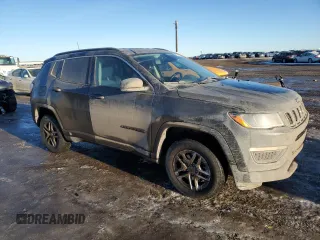2020 Jeep Compass Sport with VIN 3C4NJDAB1LT112288, listed as a Copart auction lot 87818745 with 142,408 mi miles and Clean Title. Bid and sale history available at DreamBid. Image 4.