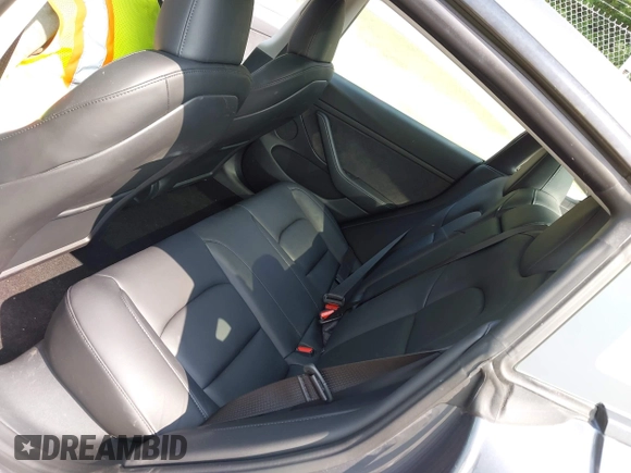 2023 Tesla Model 3 with VIN 5YJ3E1EA2PF566047, listed as a IAAI auction lot 42481008 with 21,143 mi miles and . Bid and sale history available at DreamBid. Image 8.