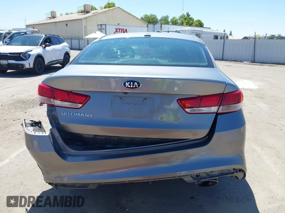 2016 Kia Optima LX with VIN 5XXGT4L36GG098804, listed as a IAAI auction lot 42772231 with 206,471 mi miles and . Bid and sale history available at DreamBid. Image 17.