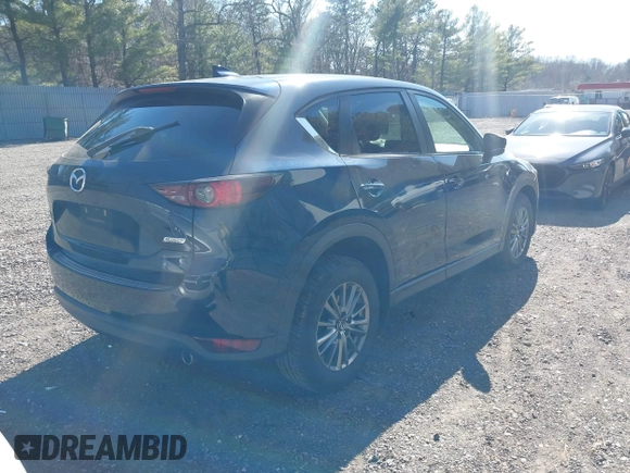 2017 Mazda CX-5 Touring with VIN JM3KFBCL5H0193919, listed as a IAAI auction lot 41751832 with 62,694 mi miles. Bid and sale history available at carsss.com. Image 4.