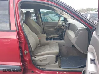2006 Jeep Grand Cherokee Laredo with VIN 1J4GS48K06C301052, listed as a IAAI auction lot 41602467 with 205,881 mi miles. Bid and sale history available at carsss.com. Image 5.