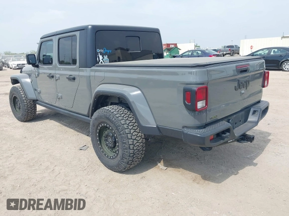2021 Jeep Gladiator Sport S z VIN 1C6JJTAM1ML607525, wystawiony jako IAAI lot #41941550 z przebiegiem 59 283 mil mil oraz . Historia ofert i sprzedaży dostępna na DreamBid. Obrazek 3.