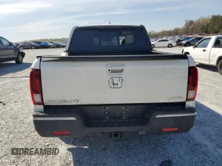 2019 Honda Ridgeline RTL-E with VIN 5FPYK3F72KB021673, listed as a Copart auction lot 50599005 with 65,469 mi miles and Salvage title. Bid and sale history available at DreamBid. Image 6.