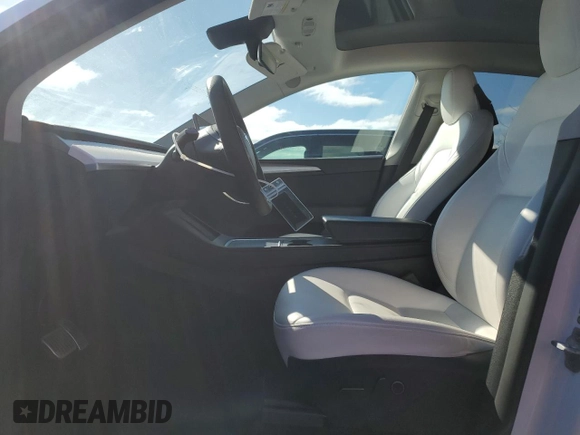 2023 Tesla Model Y Long Range z VIN 7SAYGAEE2PF758235, wystawiony jako Copart lot #49059895 z przebiegiem 57 615 mil mil oraz Czysty tytuł • Clean title. Historia ofert i sprzedaży dostępna na DreamBid. Obrazek 7.