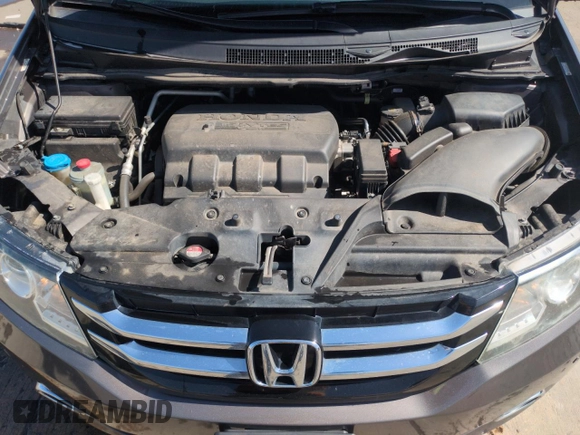 2014 Honda Odyssey Touring with VIN 5FNRL5H95EB052523, listed as a Copart auction lot 52214055 with 131,350 mi miles and Salvage Title. Bid and sale history available at DreamBid. Image 12.