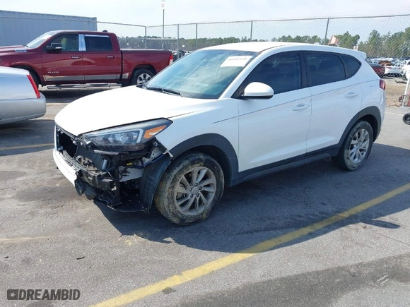 2019 Hyundai Tucson SE with VIN KM8J23A43KU934095, listed as a IAAI auction lot 41661135 with 74,315 mi miles. Bid and sale history available at carsss.com. Image 2.