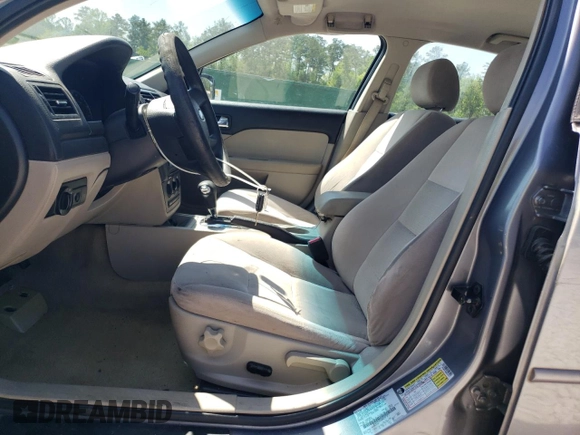 2006 Ford Fusion SE with VIN 3FAFP07Z36R227577, listed as a Copart auction lot 49771195 with 180,738 mi miles and Salvage Title. Bid and sale history available at DreamBid. Image 7.