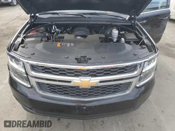 2019 Chevrolet Suburban LS z VIN 1GNSCGKC2KR297407, wystawiony jako Copart lot #75224194 z przebiegiem 93 562 mil mil oraz Szkoda całkowita • Salvage title. Historia ofert i sprzedaży dostępna na DreamBid. Obrazek 12.