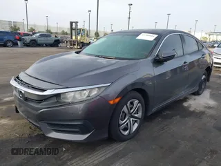 2017 Honda Civic Sedan LX with VIN 19XFC2F59HE204377, listed as a IAAI auction lot 41706604 with 160,114 mi miles. Bid and sale history available at carsss.com. Image 2.