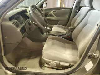 1997 Toyota Camry LE with VIN JT2BG22K8V0082736, listed as a Copart auction lot 58735955 with 54,699 mi miles and Salvage title. Bid and sale history available at DreamBid. Image 7.
