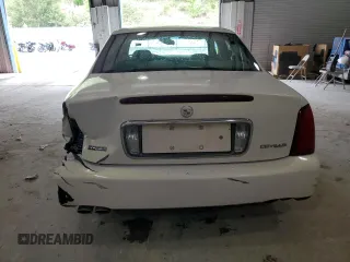 2004 Cadillac DeVille z VIN 1G6KD54Y84U137828, wystawiony jako Copart lot #53702265 z przebiegiem 156 439 mil mil oraz Szkody całkowita. Historia ofert i sprzedaży dostępna na DreamBid. Obrazek 6.