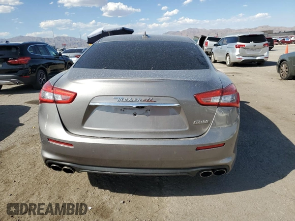 2019 Maserati Ghibli z VIN ZAM57XSA4K1315392, wystawiony jako Copart lot #67172684 z przebiegiem 30 544 mil mil oraz Szkody całkowita. Historia ofert i sprzedaży dostępna na DreamBid. Obrazek 6.