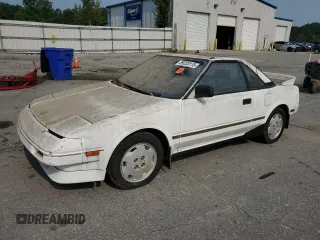 1988 Toyota MR2 z VIN JT2AW15C7J0139919, wystawiony jako Copart lot #59223115 z przebiegiem 146 918 mil mil oraz Tytuł czysty. Historia ofert i sprzedaży dostępna na DreamBid. Obrazek 1.