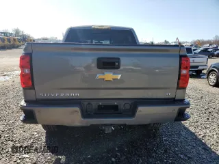 2017 Chevrolet Silverado 1500 LT with VIN 3GCUKREC0HG335785, listed as a Copart auction lot 51456305 with 104,614 mi miles and Salvage Title. Bid and sale history available at DreamBid. Image 6.