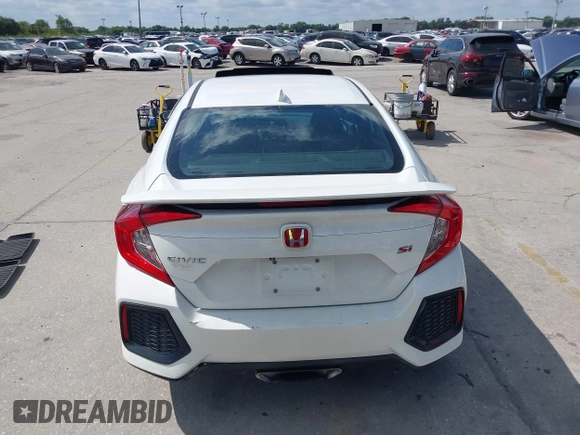 2018 Honda Civic Si with VIN 2HGFC1E53JH700251, listed as a IAAI auction lot 42043732 with 104,763 mi miles and . Bid and sale history available at DreamBid. Image 16.