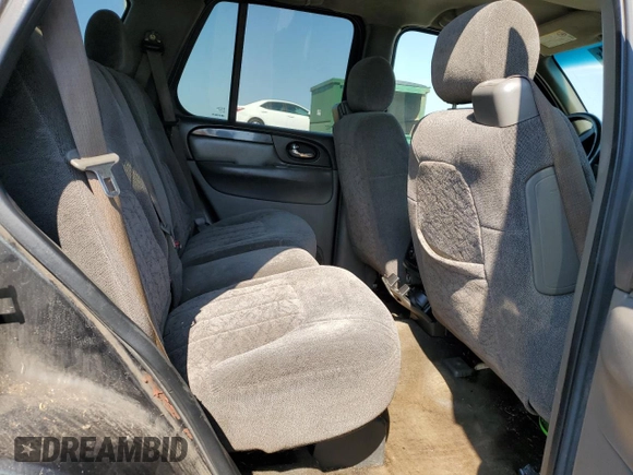 2004 GMC Envoy SLT with VIN 1GKDT13SX42423677, listed as a Copart auction lot 69012884 with Not Provided miles and Clean Title. Bid and sale history available at carsss.com. Image 11.