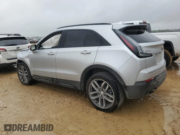 2022 Cadillac XT4 FWD Sport with VIN 1GYFZER47NF111047, listed as a Copart auction lot 50958135 with 14,448 mi miles and Salvage Title. Bid and sale history available at carsss.com. Image 2.