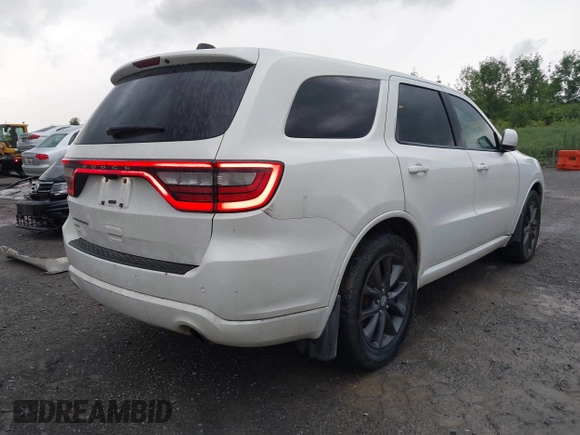 2014 Dodge Durango SXT with VIN 1C4RDJAG0EC561950, listed as a IAAI auction lot 42650331 with 106,959 mi miles and . Bid and sale history available at DreamBid. Image 4.