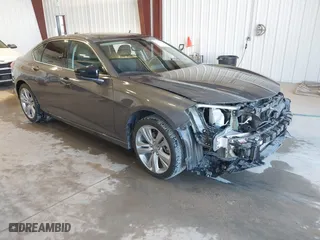 2021 Acura TLX w/Technology Package with VIN 19UUB6F46MA007285, listed as a IAAI auction lot 41517976 with 48,572 mi miles. Bid and sale history available at carsss.com. Image 1.