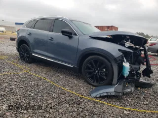 2023 Mazda CX-9 Carbon Edition with VIN JM3TCBDY8P0649319, listed as a Copart auction lot 47799745 with 56,865 mi miles and Salvage Title. Bid and sale history available at carsss.com. Image 4.