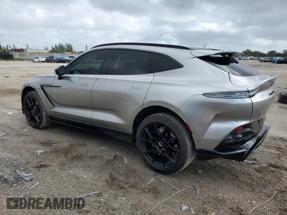 2023 Aston Martin DBX 707 z VIN SD7VUJBW0PTV08298, wystawiony jako Copart lot #77753224 z przebiegiem 3587 mil mil oraz Szkody całkowita. Historia ofert i sprzedaży dostępna na DreamBid. Obrazek 2.
