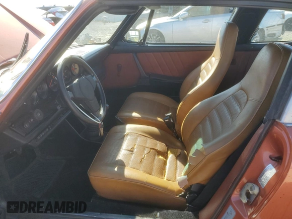 1974 Porsche 911 with VIN 9114111882, listed as a Copart auction lot 47080465 with 4,828 mi miles and Salvage title. Bid and sale history available at DreamBid. Image 7.