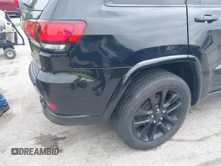 2020 Jeep Grand Cherokee Laredo E with VIN 1C4RJFAG9LC335473, listed as a IAAI auction lot 42366691 with 95,805 mi miles and . Bid and sale history available at DreamBid. Image 18.